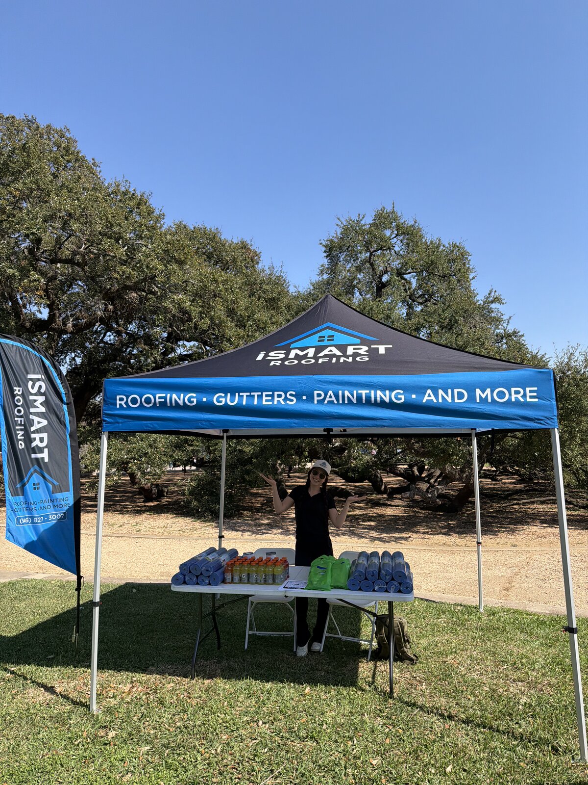 iSmart Roofing team volunteering at a charity event supporting underserved Houston-area communities